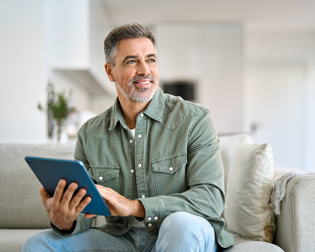 Happy Man With Tablet Computer