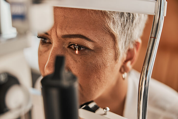 Woman having a retina scan